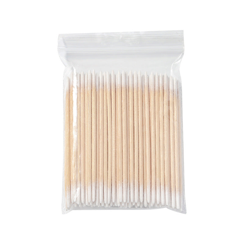 Fine-point cotton swab