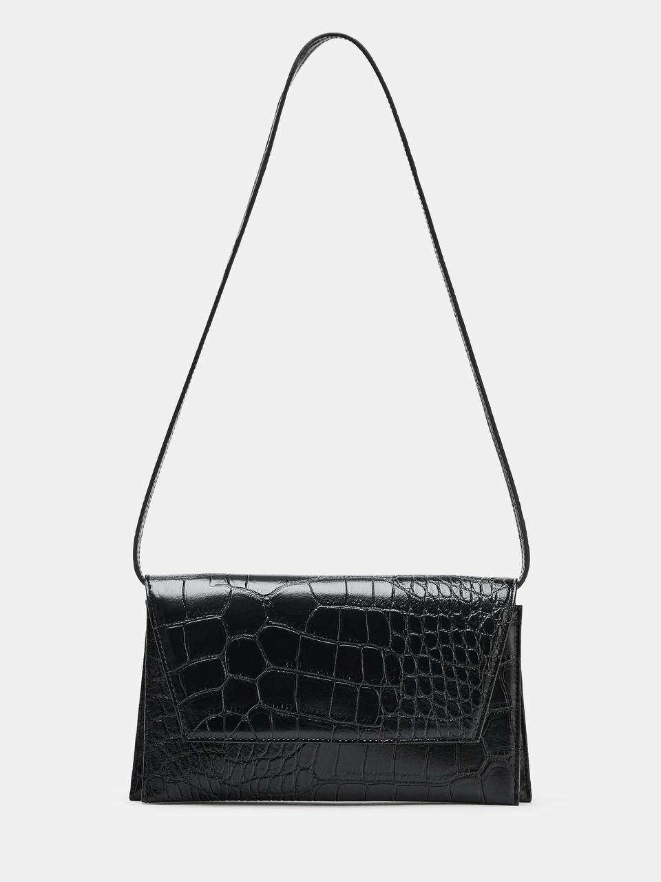 Flip-top crossbody bag