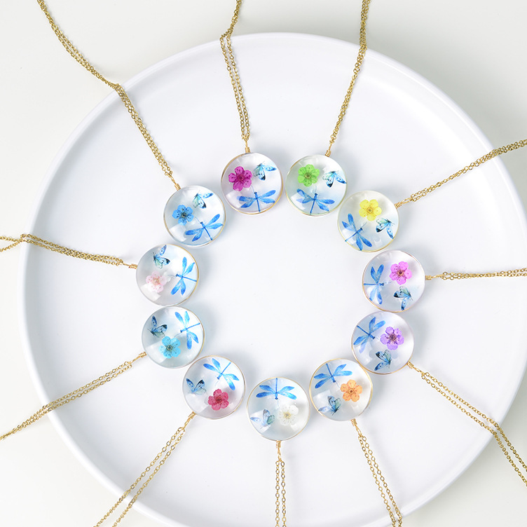 Floral Glass Pendant Necklace with Butterfly Design