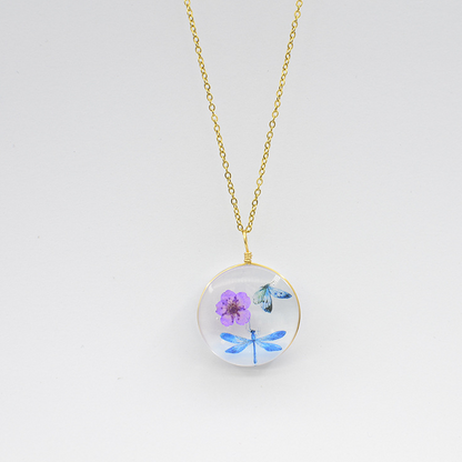 Floral Glass Pendant Necklace with Butterfly Design