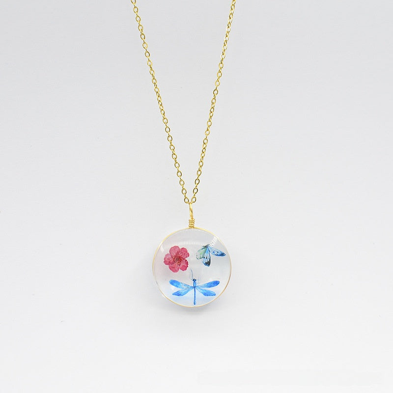 Floral Glass Pendant Necklace with Butterfly Design