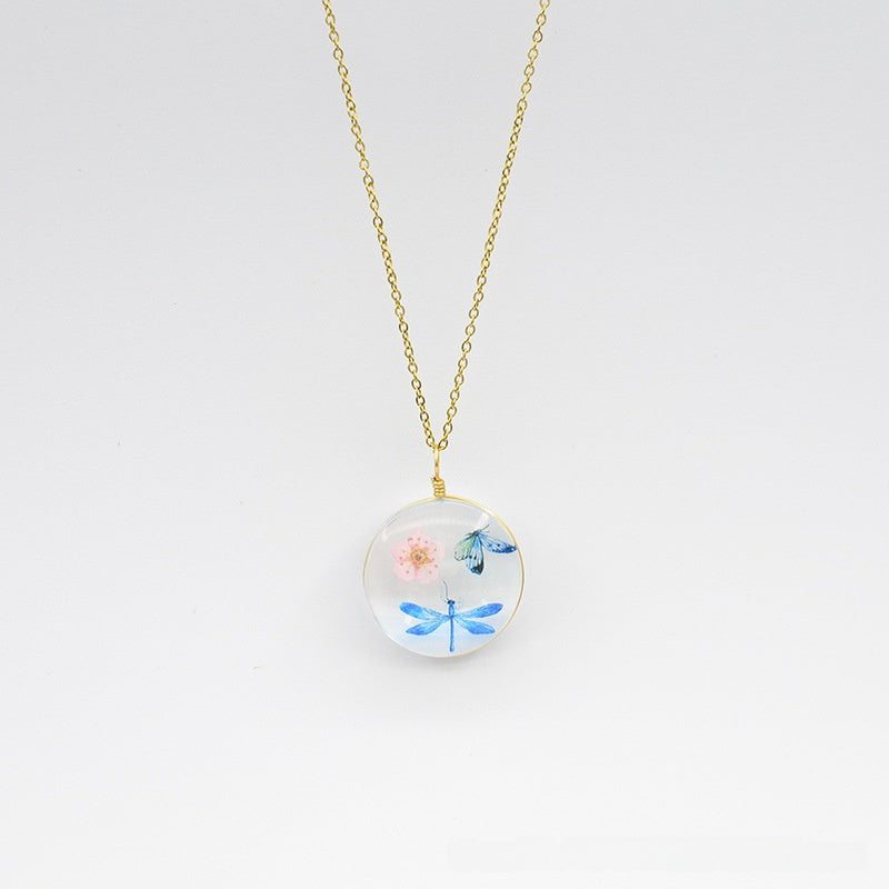 Floral Glass Pendant Necklace with Butterfly Design