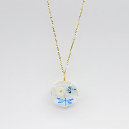 Floral Glass Pendant Necklace with Butterfly Design