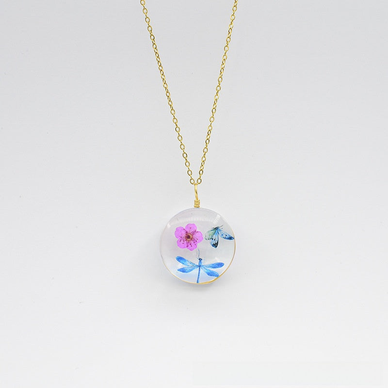 Floral Glass Pendant Necklace with Butterfly Design