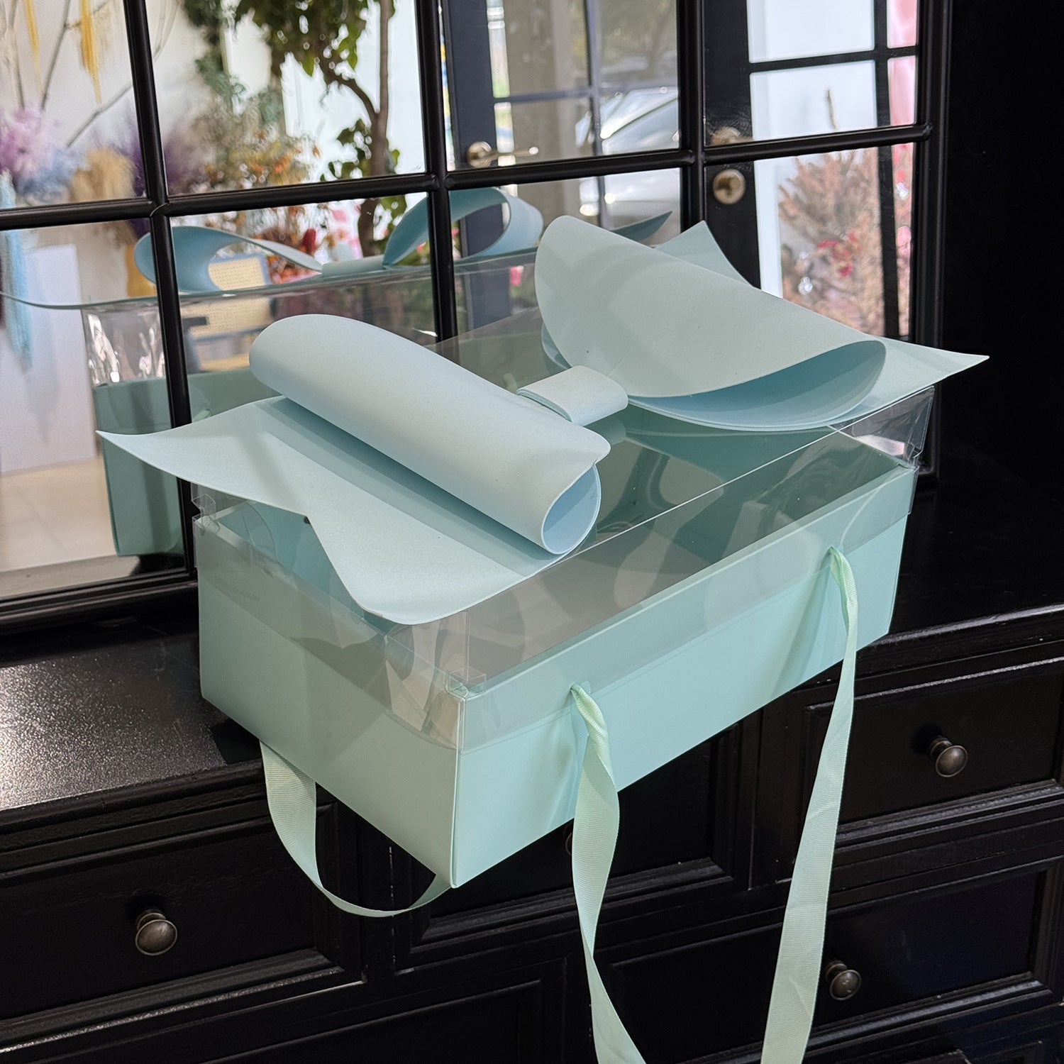 Floral hand-held flower box