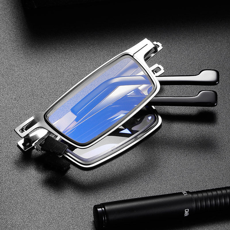 Folding reading glasses