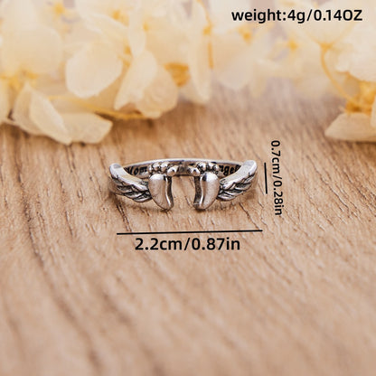 Footprints, wings, opening, ring