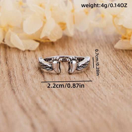 Footprints, wings, opening, ring
