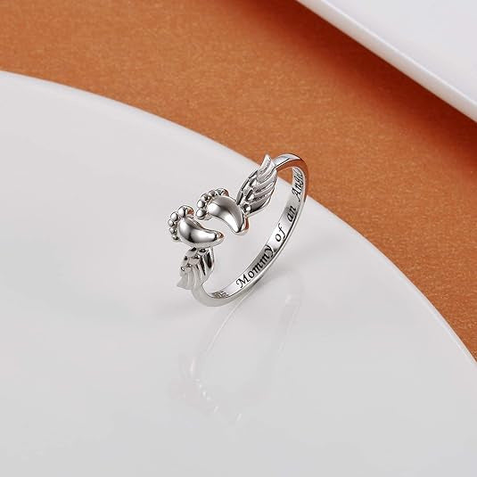 Footprints, wings, opening, ring