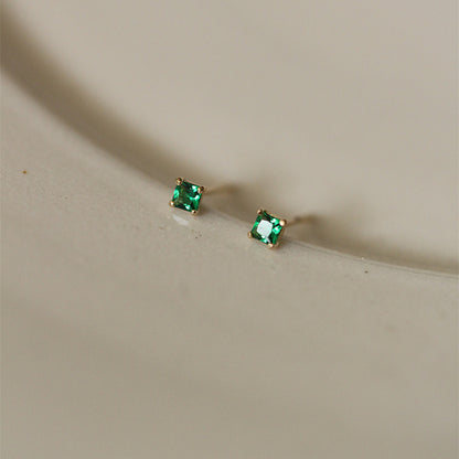 Four-claw emerald earrings