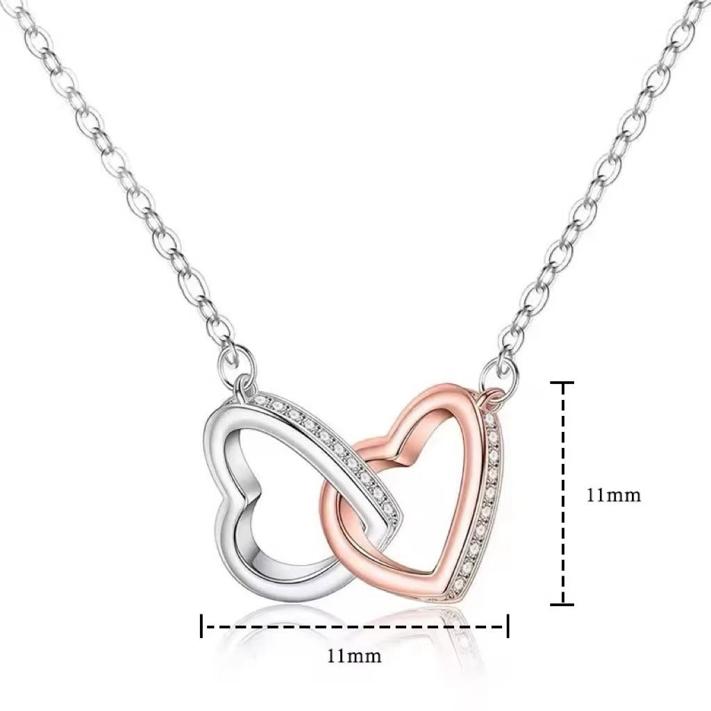 Four-leaf clover necklace with fashionable zircon heart pendant