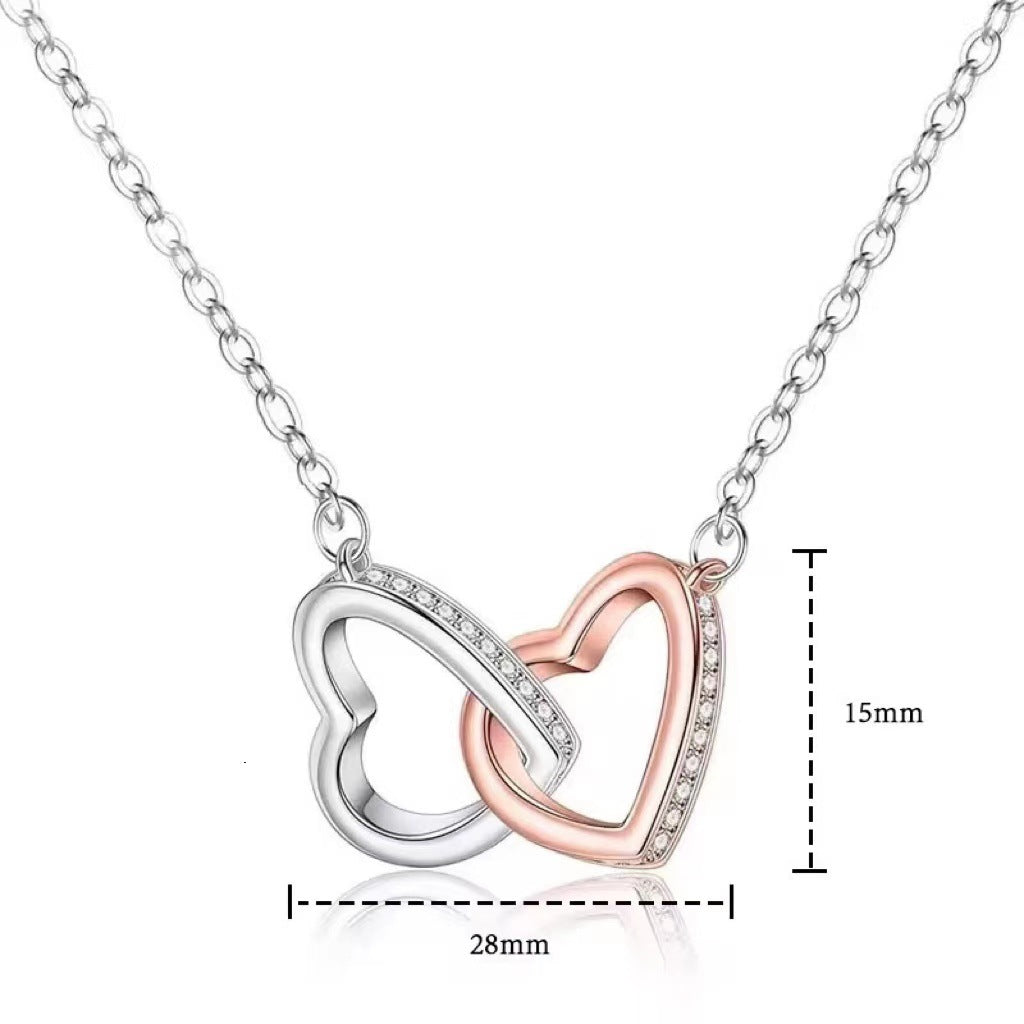 Four-leaf clover necklace with fashionable zircon heart pendant