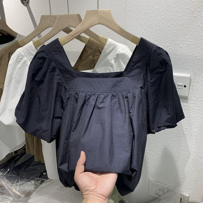 French square-neck off-the-shoulder shirt