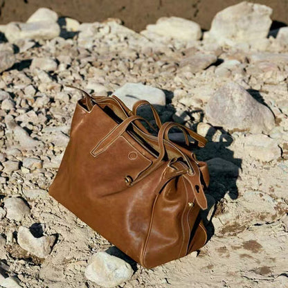 Gender-neutral vegetable-tanned leather crossbody bag