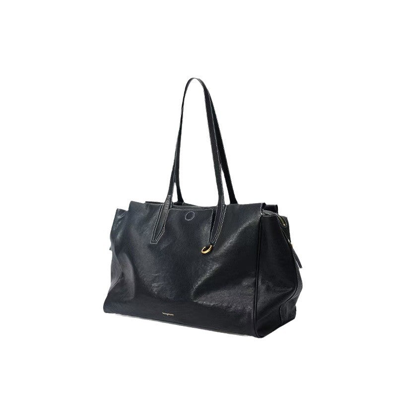 Gender-neutral vegetable-tanned leather crossbody bag
