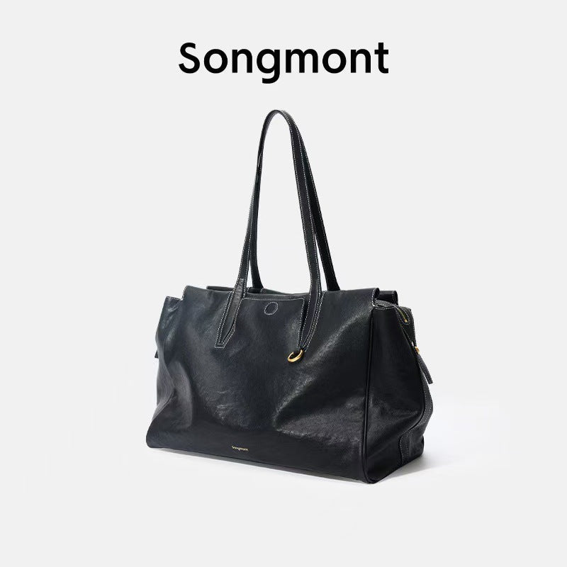Gender-neutral vegetable-tanned leather crossbody bag