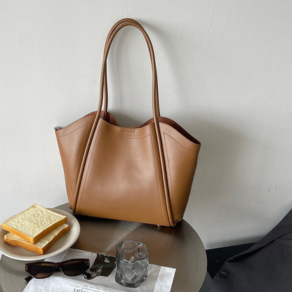 Genuine Leather Wing Design Shoulder Bag