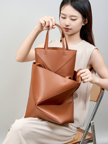 Geometric stitched folding bucket bag
