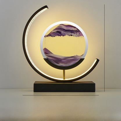 Glass hourglass table lamp