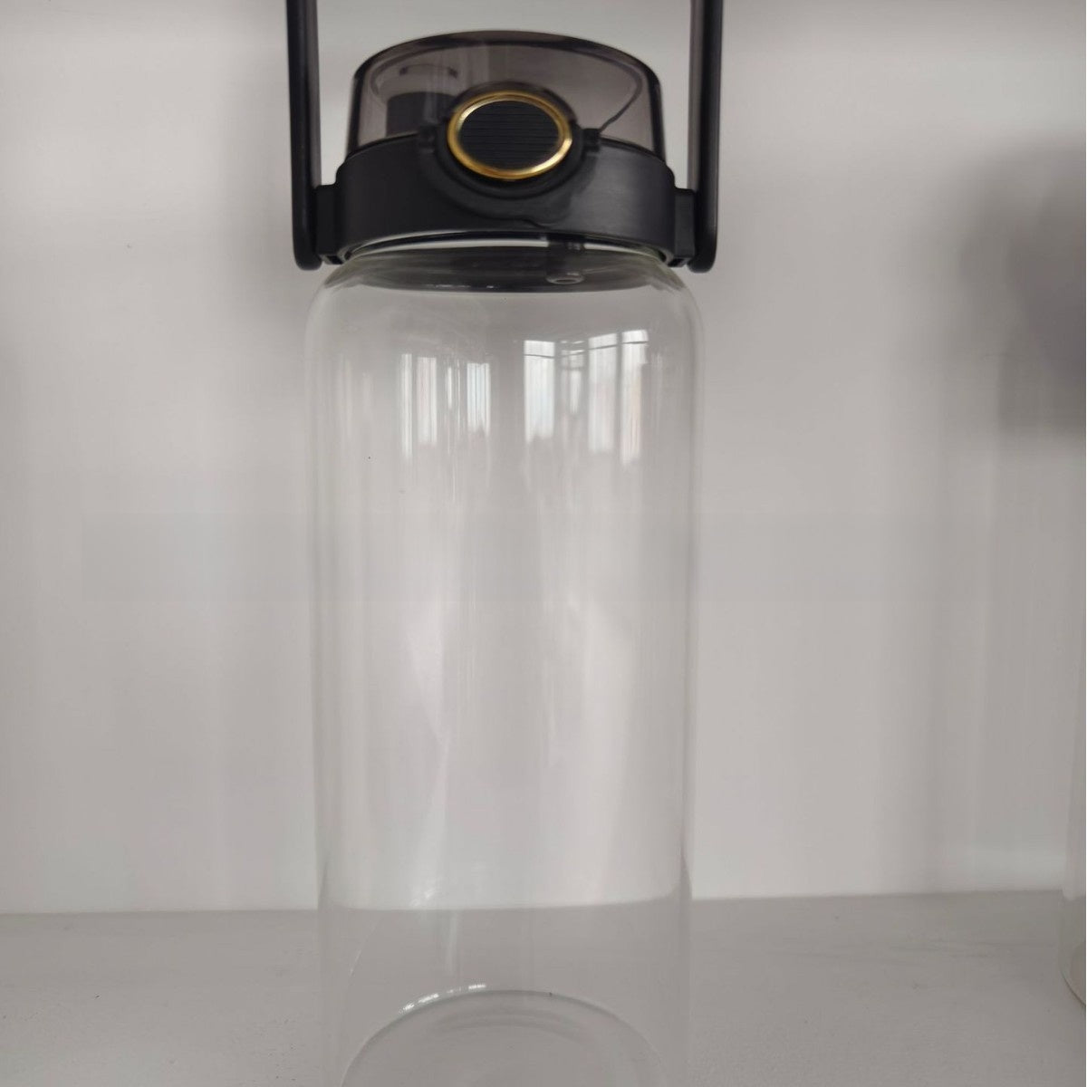 Glass Water Bottle with Silicone Sleeve and Dual Lid