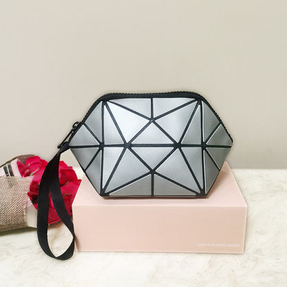 Glow-in-the-dark geometric diamond pattern bag
