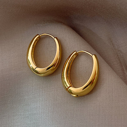 Gold and silver pigment ring earrings