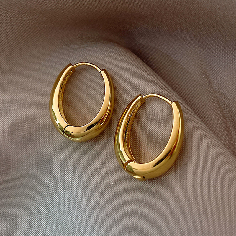 Gold and silver pigment ring earrings