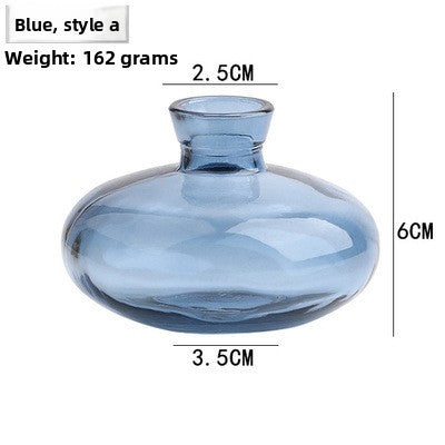 Gold-embellished transparent colored vase