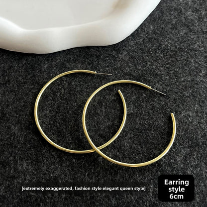 Gold Geometric Earrings with Pearl Accents