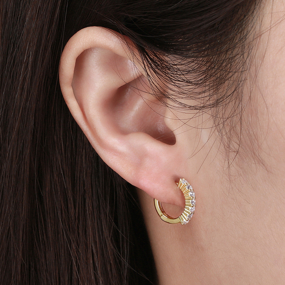 Gold stud earrings