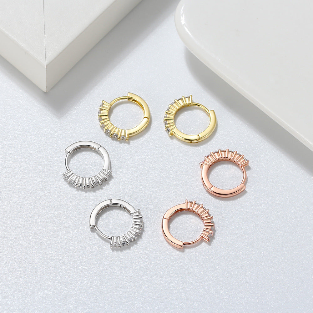 Gold stud earrings