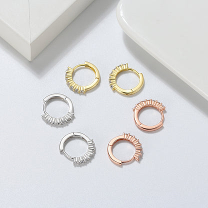 Gold stud earrings