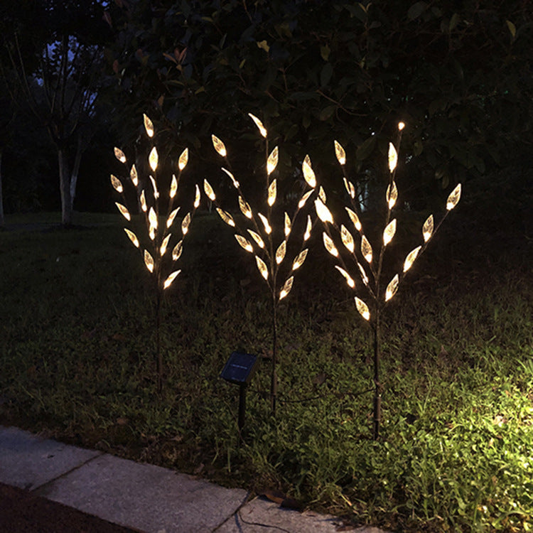 Ground-mounted tree branch lamp