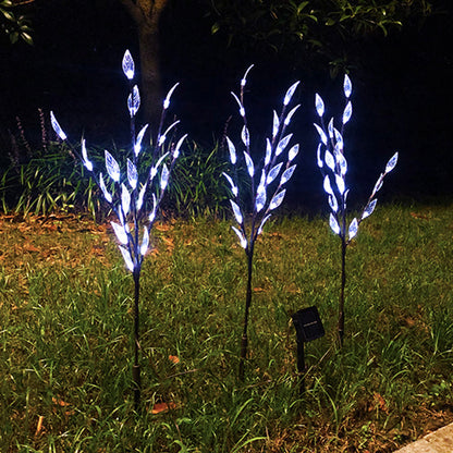 Ground-mounted tree branch lamp