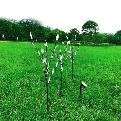 Ground-mounted tree branch lamp