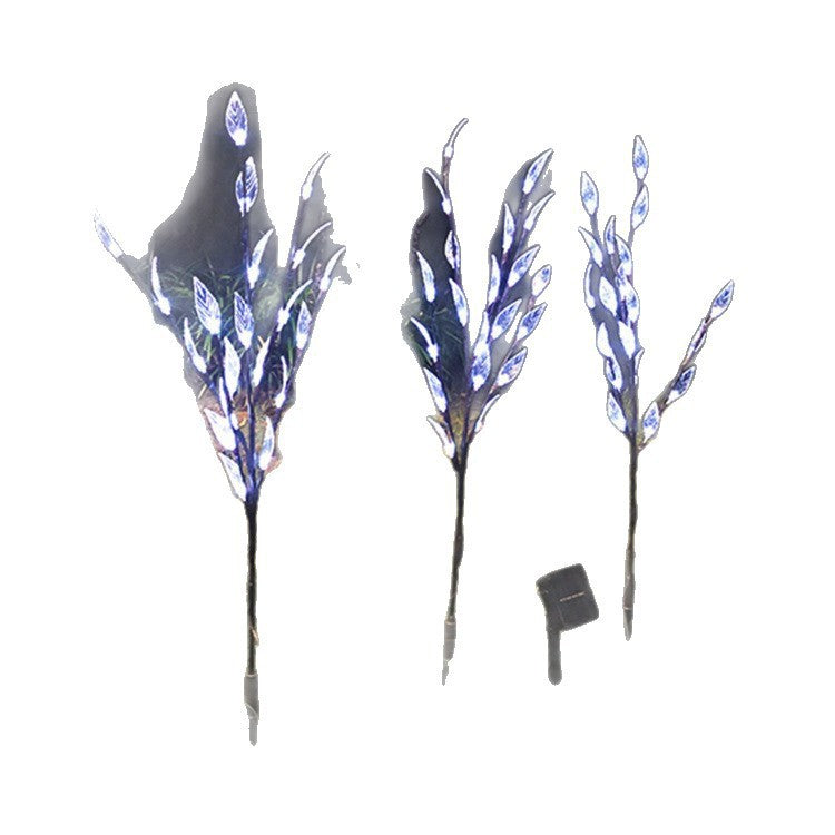 Ground-mounted tree branch lamp