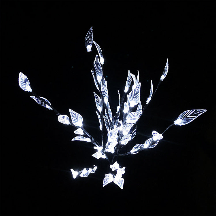 Ground-mounted tree branch lamp