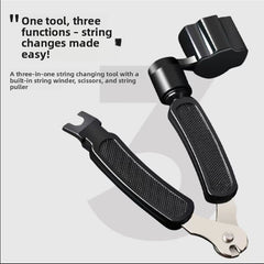 Black guitar string changing tool