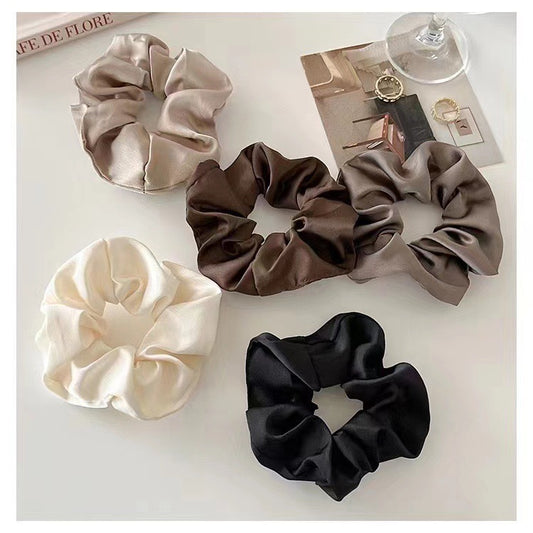 Hair ring with a hair tie, exuding a sophisticated vibe