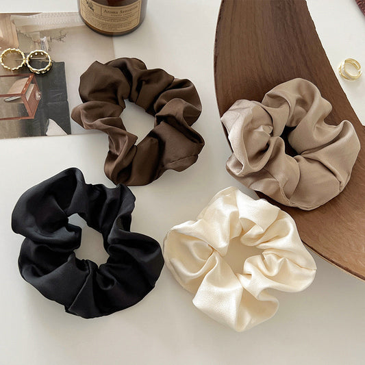 Hair ring with a hair tie, exuding a sophisticated vibe