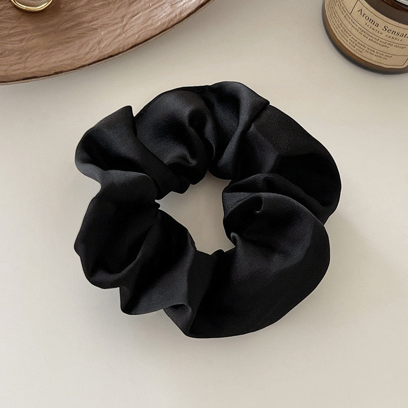 Hair ring with a hair tie, exuding a sophisticated vibe