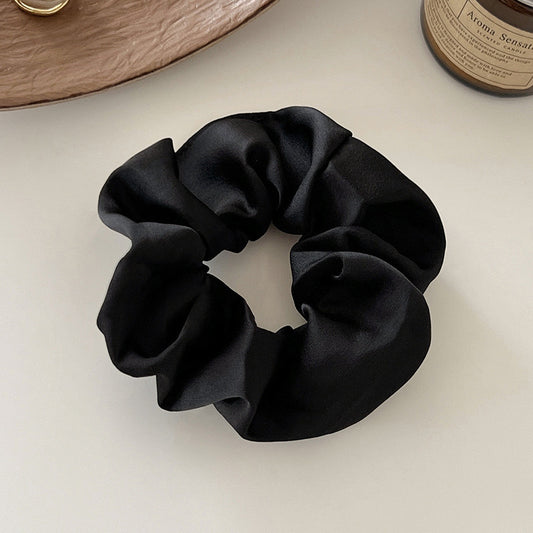 Hair ring with a hair tie, exuding a sophisticated vibe