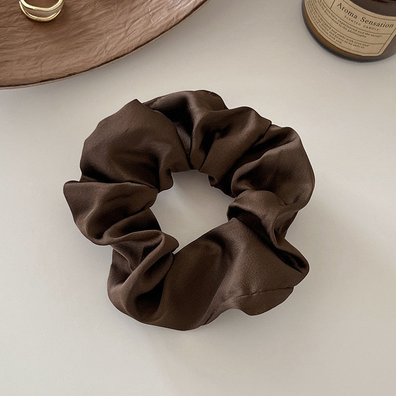 Hair ring with a hair tie, exuding a sophisticated vibe