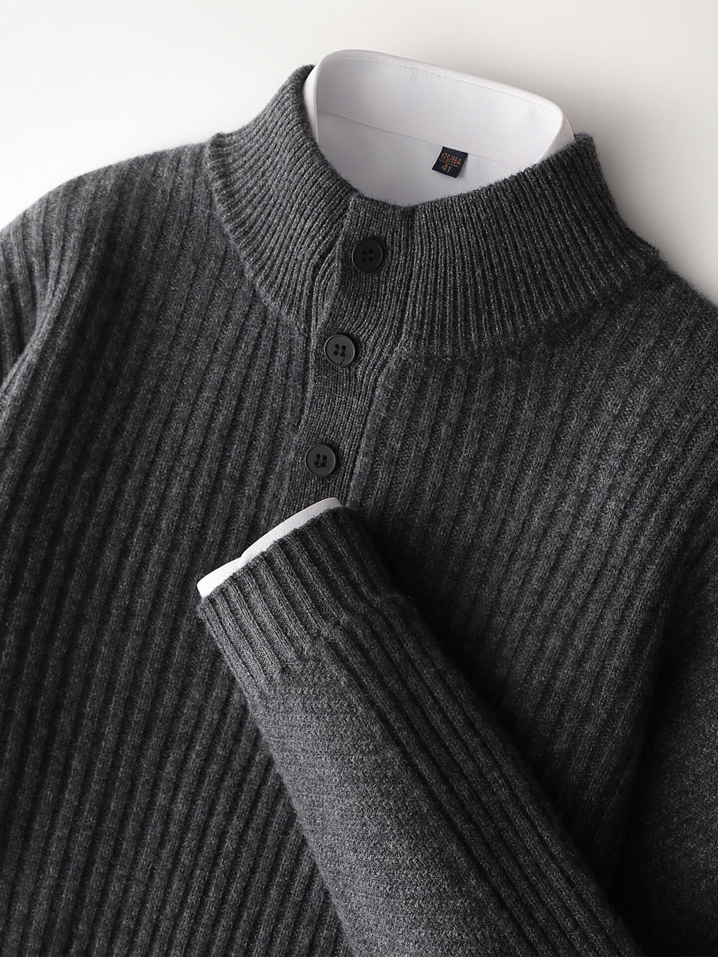 Half-neck buttoned wool sweater