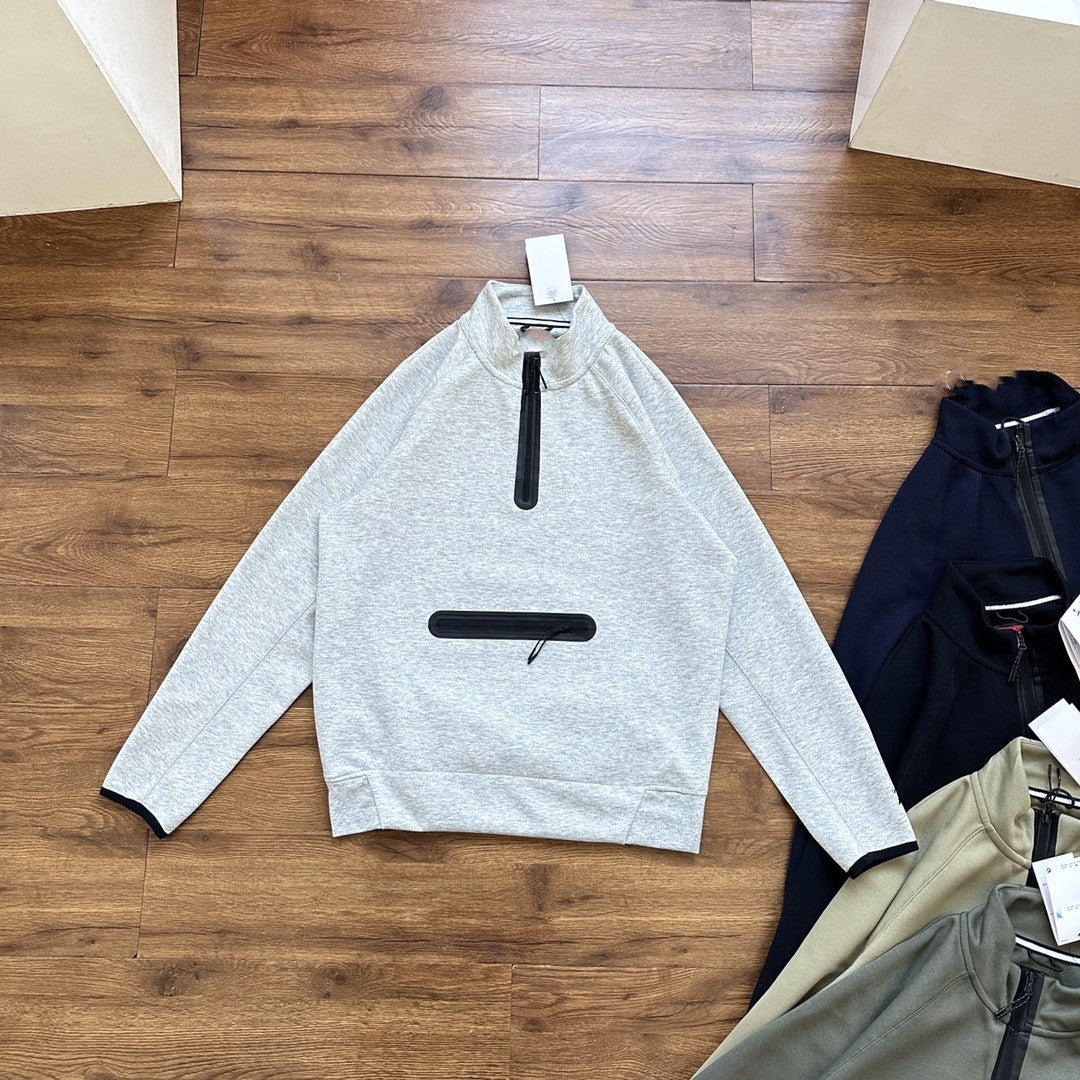 Half-zip raglan sleeve stand-up collar sweatshirt