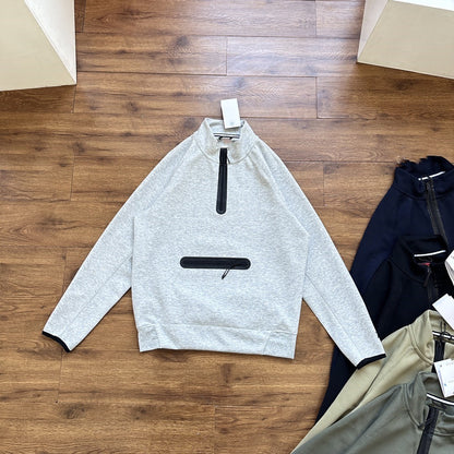 Half-zip raglan sleeve stand-up collar sweatshirt