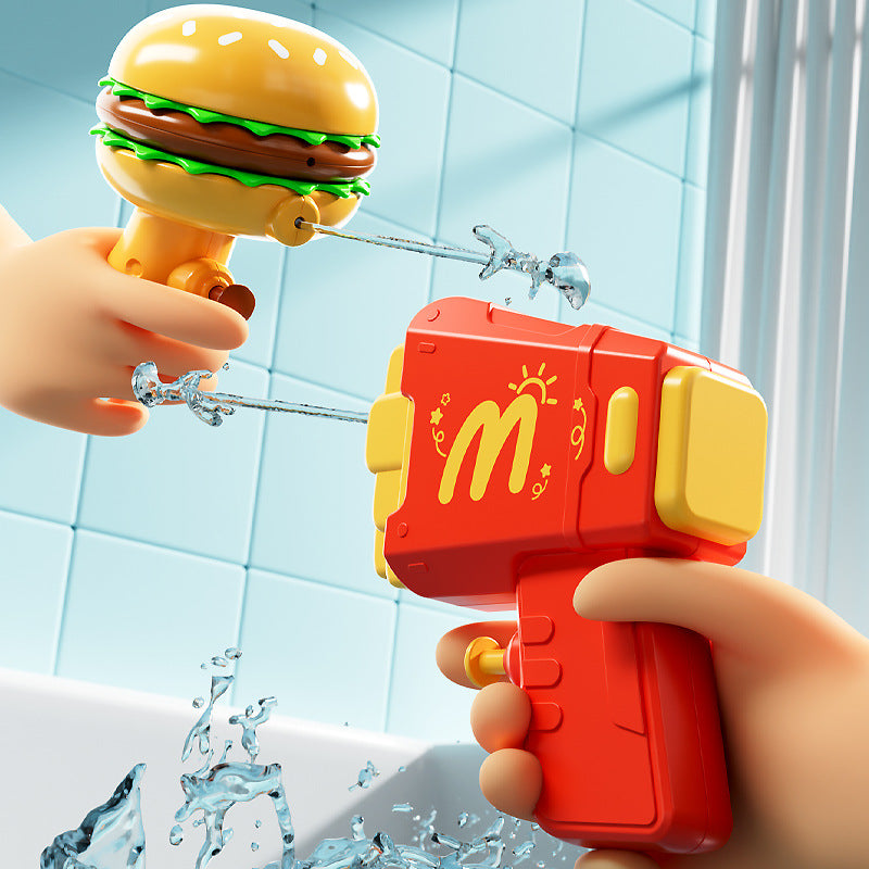 Hamburgers, fries, toy water gun