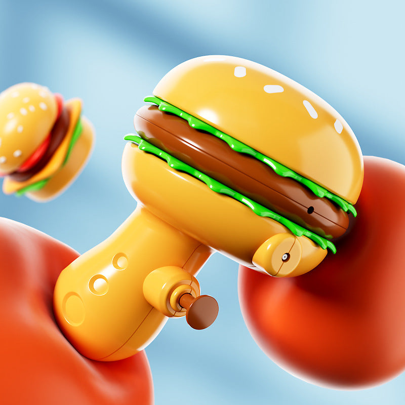 Hamburgers, fries, toy water gun