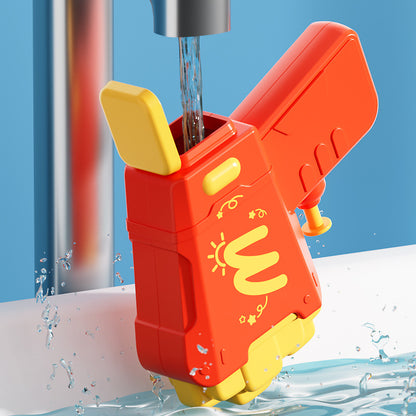 Hamburgers, fries, toy water gun