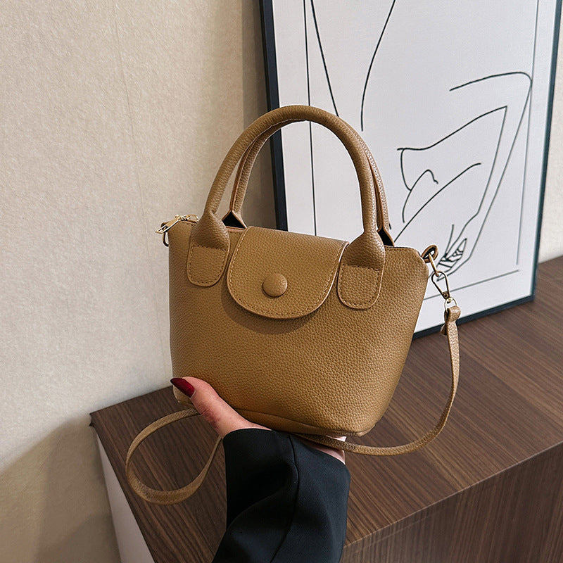 Hand-held bucket bag